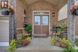 Brick  with siding and a covered porch - 