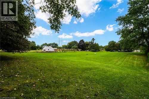 Expansive green lawn with mature trees and a unique geodesic dome structure - 1412 Old York Road, Burlington, ON 