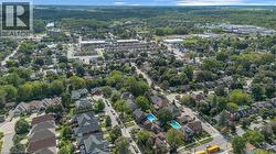 Residential neighborhood with abundant mature trees and multiple private swimming pools - 