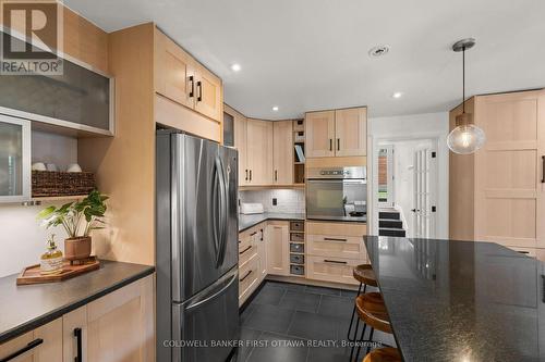 Bar fridge, & endless storage space throughout! - 849 Maplewood Avenue, Ottawa, ON 