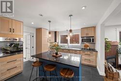 Breakfast bar seating on the oversized island! - 