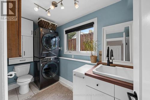 2pc bathroom w stacked laundry & electrical closet - 849 Maplewood Avenue, Ottawa, ON 