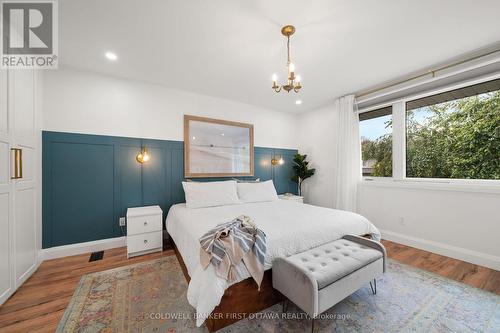 Primary bedroom w hanging fixture. - 849 Maplewood Avenue, Ottawa, ON 
