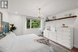 Expansive window & additional  pot lights above. - 