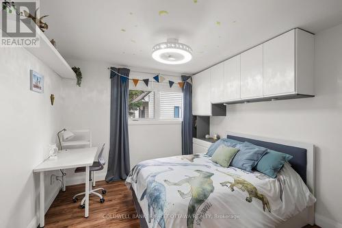 Bedroom w light fixture & built in fan above. - 849 Maplewood Avenue, Ottawa, ON 