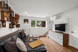 Built in shelving and additional storage closet. - 