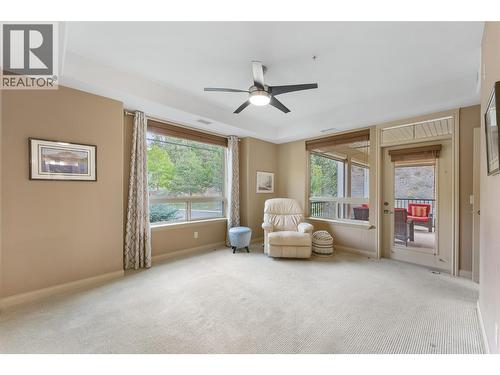 Large king-sized primary bedroom with direct access to the deck. - 2780 Auburn Road Unit# 203, West Kelowna, BC 