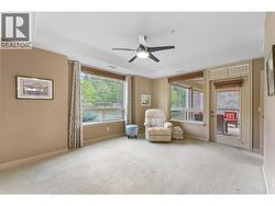 Large king-sized primary bedroom with direct access to the deck. - 