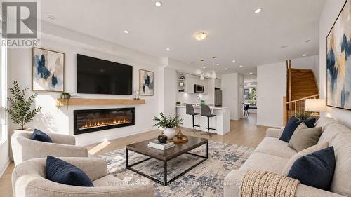 Virtually Staged Living Room and Kitchen - 1 - 70 Green Gardens Boulevard, Toronto, ON 