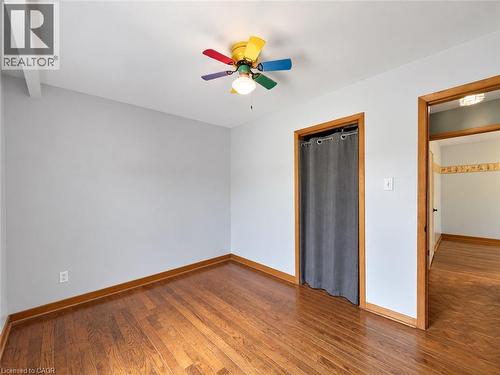 Wood-finish flooring with coordinating wood trim - 2490 Yarmouth Crescent, Oakville, ON 