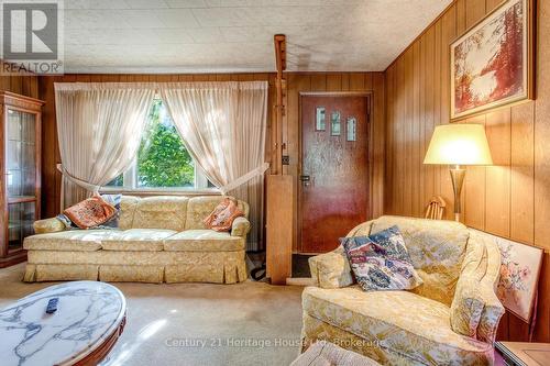 Living room,  large window and front entry door - 91 Merion Street, Guelph (Junction/Onward Willow), ON 