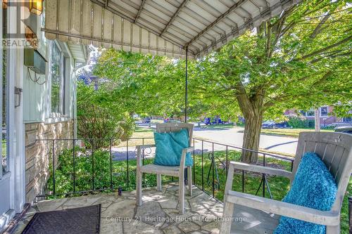 Front porch, railing and space for sitting - 91 Merion Street, Guelph (Junction/Onward Willow), ON 