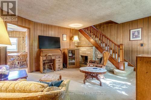 Living room - carpeted,  hardwood under carpet - 91 Merion Street, Guelph (Junction/Onward Willow), ON 
