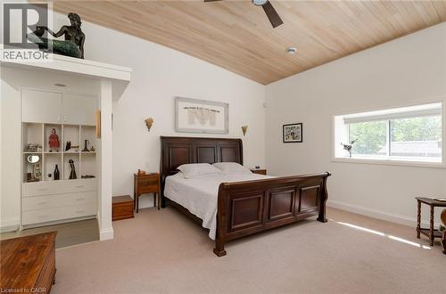 Vaulted wood-paneled ceiling with a flush-mount light and ceiling fan - 23 Market Street W, Port Dover, ON 