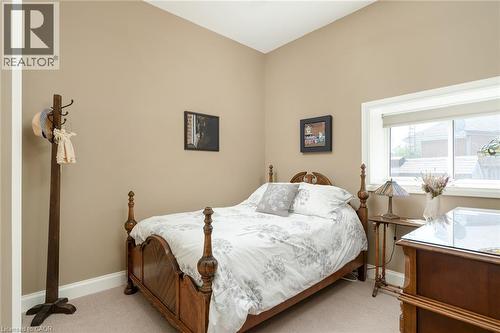 Neutral-toned walls complement plush carpeting - 23 Market Street W, Port Dover, ON 