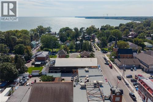 Waterfront community with extensive tree coverage and a prominent church steeple - 23 Market Street W, Port Dover, ON 