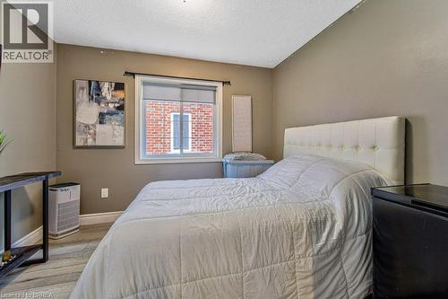 Wood-finish flooring with neutral wall tones - 423 Poldon Drive, Norwich, ON 