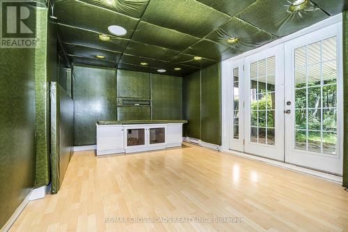 Media/Rec Room with Walkout to Rear Yard - 19 Strathgowan Crescent, Toronto, ON 