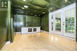 Media/Rec Room with Walkout to Rear Yard - 