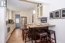 Kitchen with Granite Breakfast BAr - 19 Strathgowan Crescent, Toronto, ON 