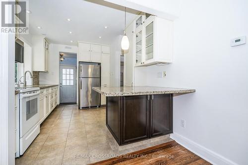 Bright Kitchen with Walk-Out - 19 Strathgowan Crescent, Toronto, ON 