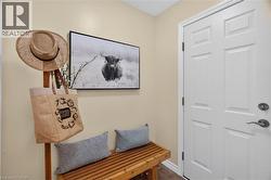 Four-panel door with dark hardware, alongside a wooden slatted bench - 