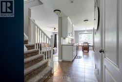 front hall looking into kitchen and living room - 