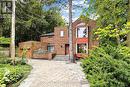 Home framed by mature trees on prestigious area - 40 Donino Avenue, Toronto, ON 