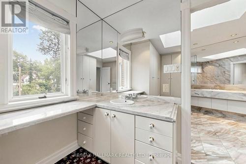 Well-appointed 4-piece bathroom with Granite tiles - 40 Donino Avenue, Toronto, ON 