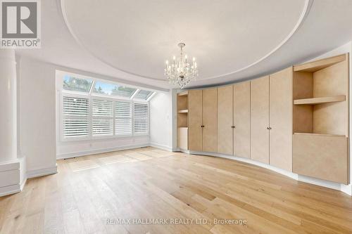 Dining room with hardwood floors and storage space - 40 Donino Avenue, Toronto, ON 