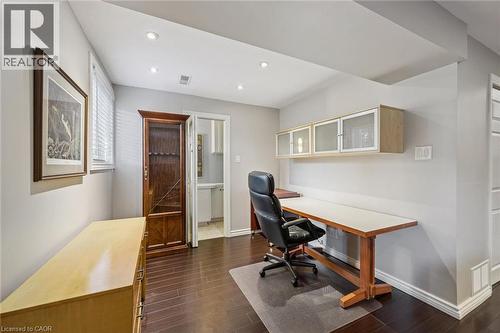 Recessed lighting illuminates wood-finish flooring - 35 Crosby Drive, Kitchener, ON 
