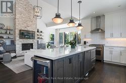 Oversized centre island with bar fridge - 