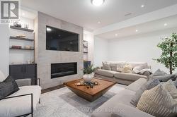 Basement recroom with cozy gas fireplace - 