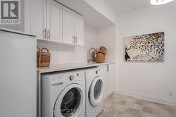 Large laundry room + sink in the basement - 