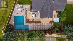 Aerial of the deck, hot tub, patio and pool - 