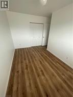 Main bedroom with wood-type flooring - 