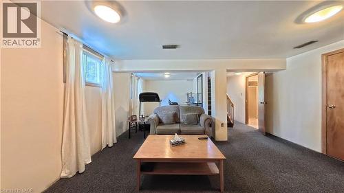 Recessed ceiling lighting, carpeted flooring, wood-finish interior doors, and a wood-finish staircase - 56 Scenic Wood Crescent, Kitchener, ON 