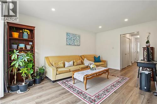 Recessed lighting illuminates wood-finish flooring - 1444 Upper Ottawa Street Unit# 32, Hamilton, ON 
