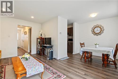 Recessed lighting, wood-finish flooring, and white walls create a bright interior - 1444 Upper Ottawa Street Unit# 32, Hamilton, ON 
