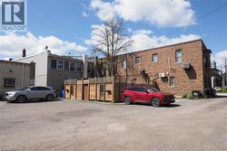 Gravel parking area accommodating multiple vehicles - 