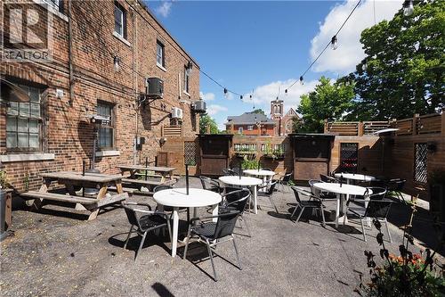 Brick exterior building with multiple windows - 707 E King Street E, Cambridge, ON 