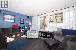 Recessed lighting, drop ceiling, and multiple windows - 