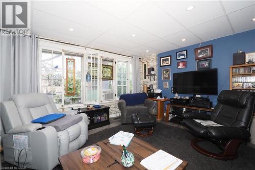 Recessed lighting illuminating the space, with a drop ceiling - 707 E King Street E, Cambridge, ON 