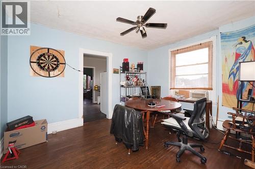 Wood-finish flooring with light blue walls and white trim - 707 E King Street E, Cambridge, ON 