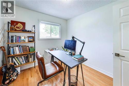 Hardwood flooring, painted walls, white trim, and a window with natural light - 35 Shirlea Boulevard, Keswick, ON 