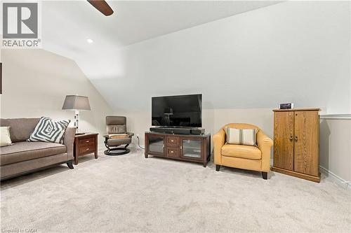 Plush carpeting, recessed lighting, and a ceiling fan - 31 Book Road Unit# 44, Grimsby, ON 