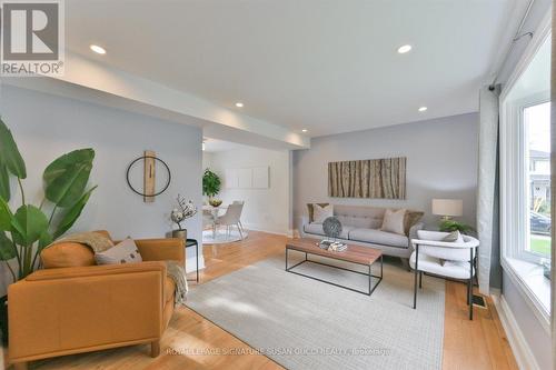 Spacious living room with light pouring in - 29 Topham Road, Toronto, ON 