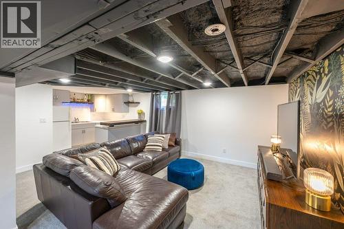 Basement family or media room with wet bar - 886 Fairview Road, Oliver, BC 