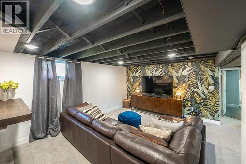 Basement family or media room with wet bar - 886 Fairview Road, Oliver, BC 