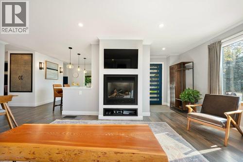 Front entry, living room with gas fireplace - 886 Fairview Road, Oliver, BC 